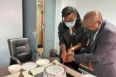 Dr Loice Cutting cake with Dr, Chakaya